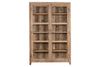 The nkuku Ibo Reclaimed Wood & Glass Cabinet - Natural - Wide features two glass-paneled doors, five inside shelves, antique brass handles, and four short legs. Crafted from weathered wood for a tall, rustic look.