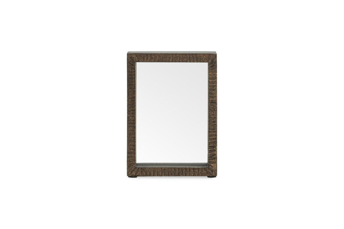 The Indu Standing Mango Wood Frame - Dark Ash by nkuku is a rectangular mirror with a thick, dark sustainable mango wood frame, shown upright against a plain white background.