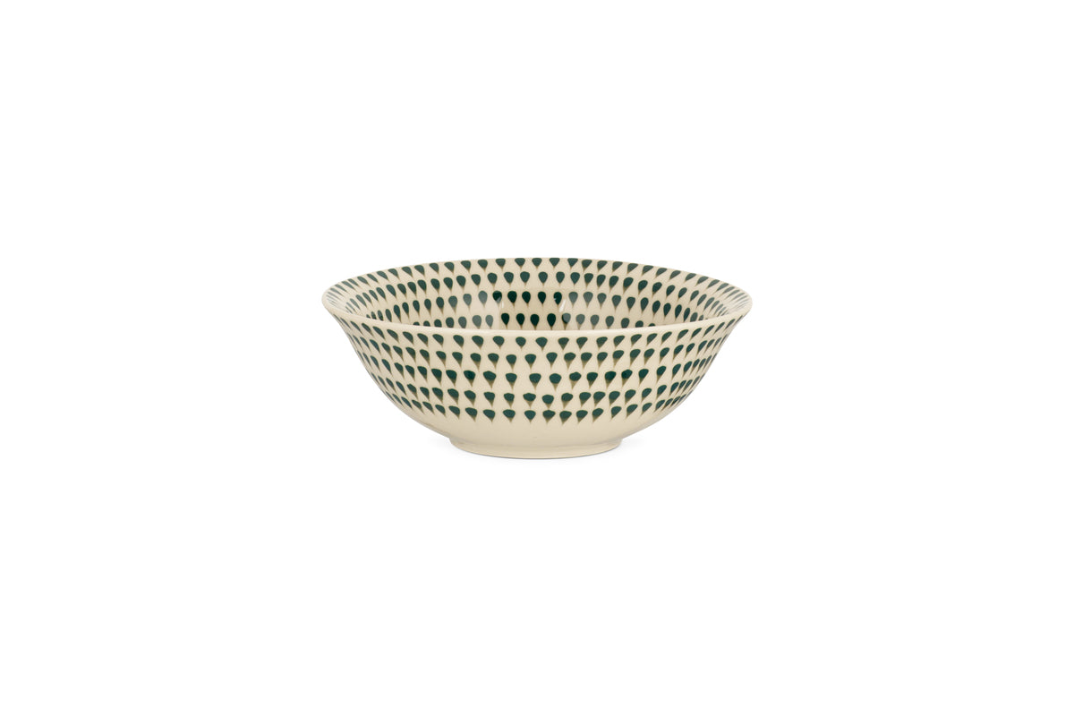 The nkuku Juniper Drop Dinnerware Set - Cream & Juniper (Set of 12) showcases cream ceramic pieces adorned with evenly spaced juniper green drop designs, displayed elegantly on a white background.