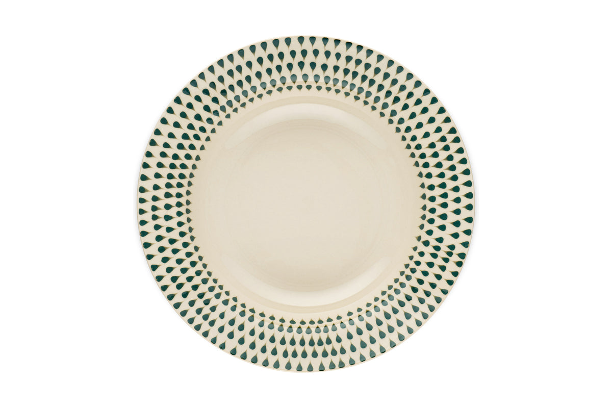 The nkuku Juniper Drop Pasta Bowl in cream and juniper features a modern ceramic design with green teardrop motifs around the rim on a white background, perfect for contemporary table settings.
