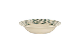 The Juniper Drop Pasta Bowl - Cream & Juniper by nkuku is a cream ceramic bowl with green teardrop designs around the inner rim, offering a modern touch to your contemporary tableware collection.