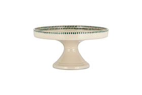 The nkuku Juniper Drop Ceramic Stand in Cream & Juniper features a wide base, round top, and a decorative green drop edge from the Juniper Drop collection.