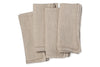 The nkuku Junto Linen Napkin - Natural (Set of 4) features four neatly folded beige linen napkins stacked against a white background, showcasing the fabrics visible texture.