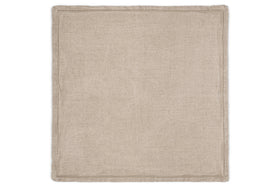 The nkuku Junto Linen Napkin - Natural (Set of 4) features rectangular beige napkins with stitched edges, offering a neutral touch to your table and lying flat against any surface.