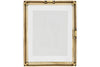 The Jahala Wall Hung Photo Frame by nkuku features a rectangular antique brass frame with decorative ridges and black screws at the corners and sides, and includes a white mat. Shown empty against a white background.