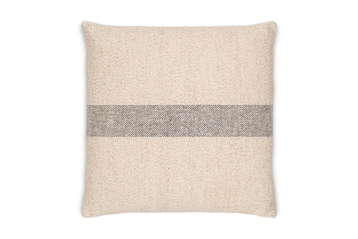 The nkuku Kallu Wool & Cotton Cushion Cover - Natural is a square beige cushion cover with textured fabric and a blue-grey horizontal center stripe, shown on a white background.