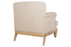 The Kashi Linen Armchair - Natural by nkuku features beige upholstery and a solid mango wood frame with wooden legs, displayed from the back against a white background.