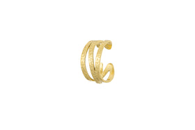 The Katai Ring - Gold by nkuku features three parallel, hammered texture bands with a subtle engraved pattern, displayed against a plain white background.