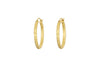 The Labani Earrings - Gold by nkuku feature a timeless hammered texture and are showcased against a white background.