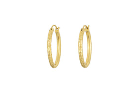 The Labani Earrings - Gold by nkuku feature a timeless hammered texture and are showcased against a white background.