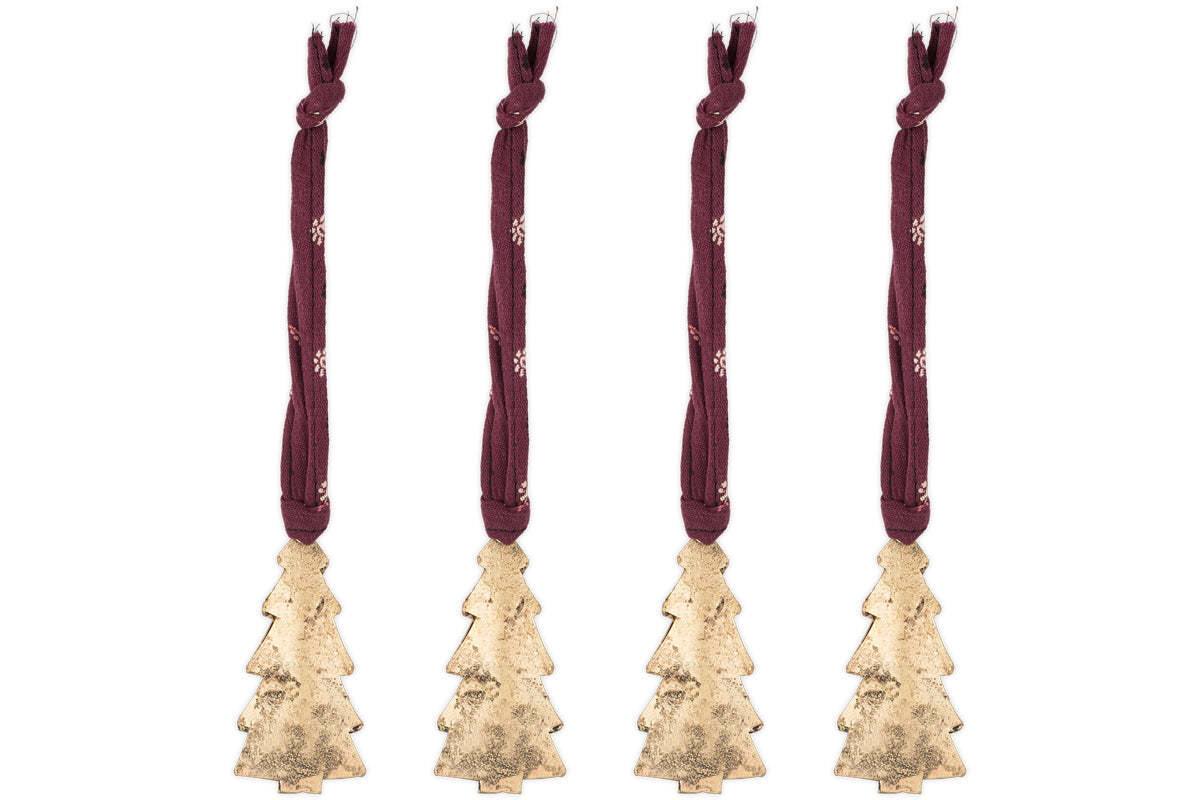 The nkuku Mishti Tree Baubles - Antique Brass - Small (Set of 4) feature gold-colored iron ornaments in tree shapes, each hanging from a burgundy ribbon with white snowflakes and finished in antique brass. Perfect for festive decorating.