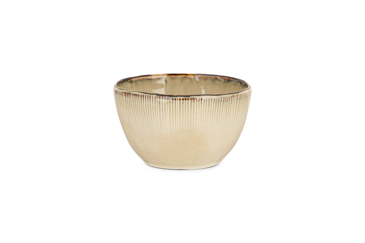 The nkuku Malia Breakfast Bowl - Cream features a ribbed texture, organic shape, and slightly uneven glossy rim with reactive glaze, shown here against a white background.