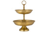 The Mahika Stand - Antique Brass by nkuku is a two-tiered gold metal stand with textured bowls and a top handle, ideal as a centrepiece for festive tablescapes or for displaying fruits, desserts, or snacks.