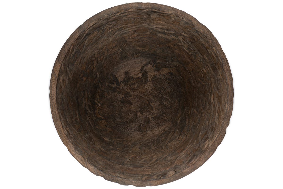 The nkuku Nyati Wooden Serving Bowl—Large, Dark Brown—features a round mango wood design with a textured, hand-carved interior and stylish woven pattern around the sides. Beautifully handcrafted from sustainable wood.