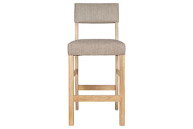 The nkuku Nadeeka Linen Upholstered Counter Chair in Soft Grey features a simple, modern design with a natural wood frame and legs. Its soft grey linen seat and backrest are shown from the front against a white background—ideal for kitchen islands.