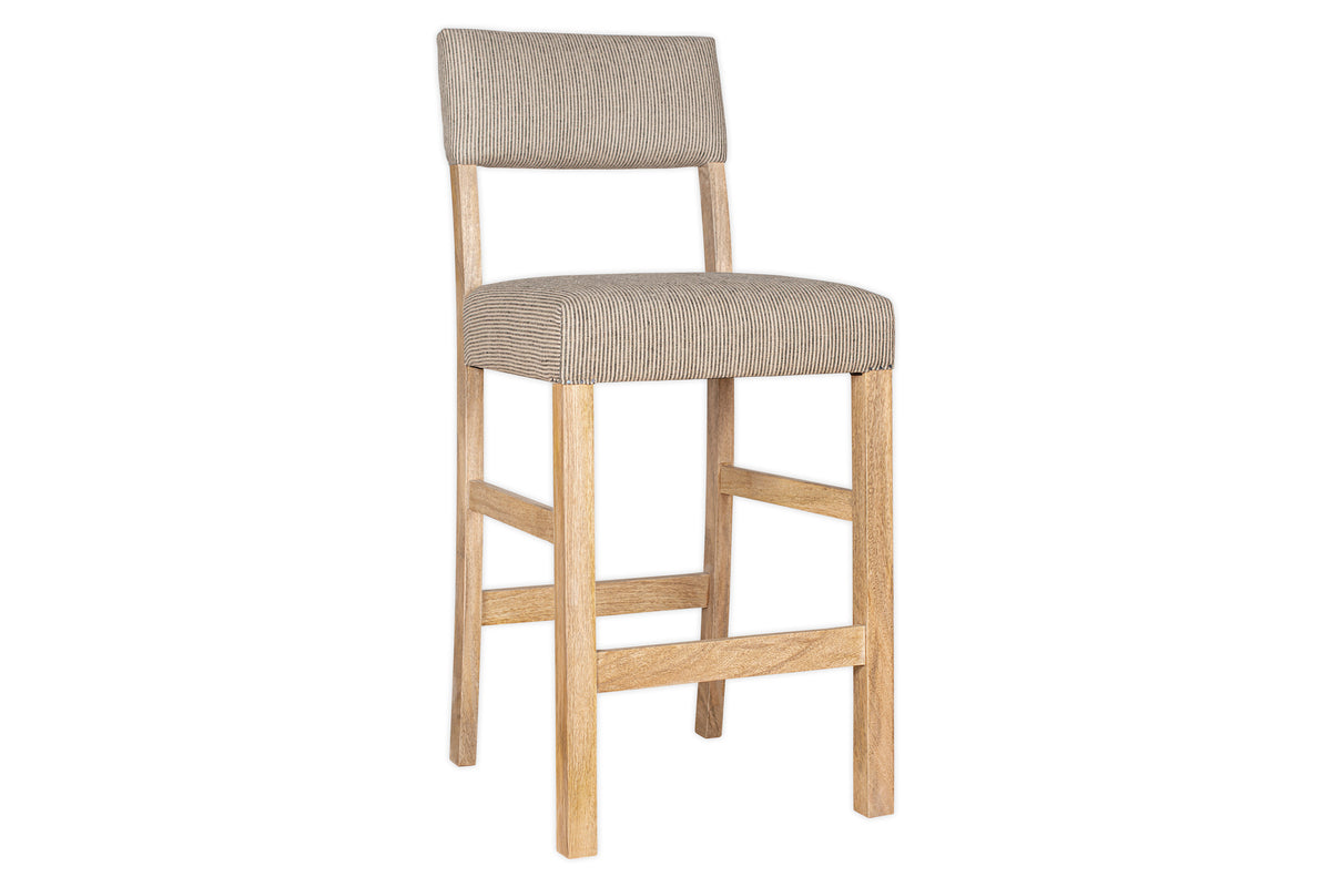 The nkuku Nadeeka Linen Upholstered Counter Chair features a soft grey linen seat and backrest, sturdy wooden frame with four straight legs and support bars, making it perfect for your kitchen island.