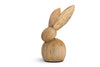 The nkuku Khara Mango Wood Rabbit Standing Decoration features a minimalist round body, long upright ears, and visible natural wood grain—ideal for Easter décor or as a stylish bunny accent.