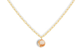 The Cerita Rhodochrosite Necklace by nkuku features a gold chain with elongated links and a striking rhodochrosite and gold-plated pendant, blending beige and light brown tones—an elegant jewellery gift.