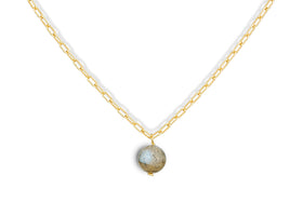 The Marai Labradorite Necklace by nkuku features a gold chain with elongated links and a central round labradorite pendant, displaying blue and brown flecks—an elegant jewelry gift.