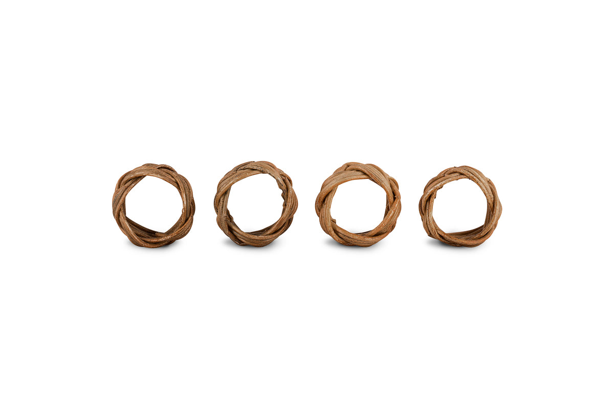 Four nkuku Bersama Rattan Napkin Rings, handcrafted from natural braided fibers, are arranged in a row on a white background. Each of the set of 4 features an earthy woven texture for rustic table decor.