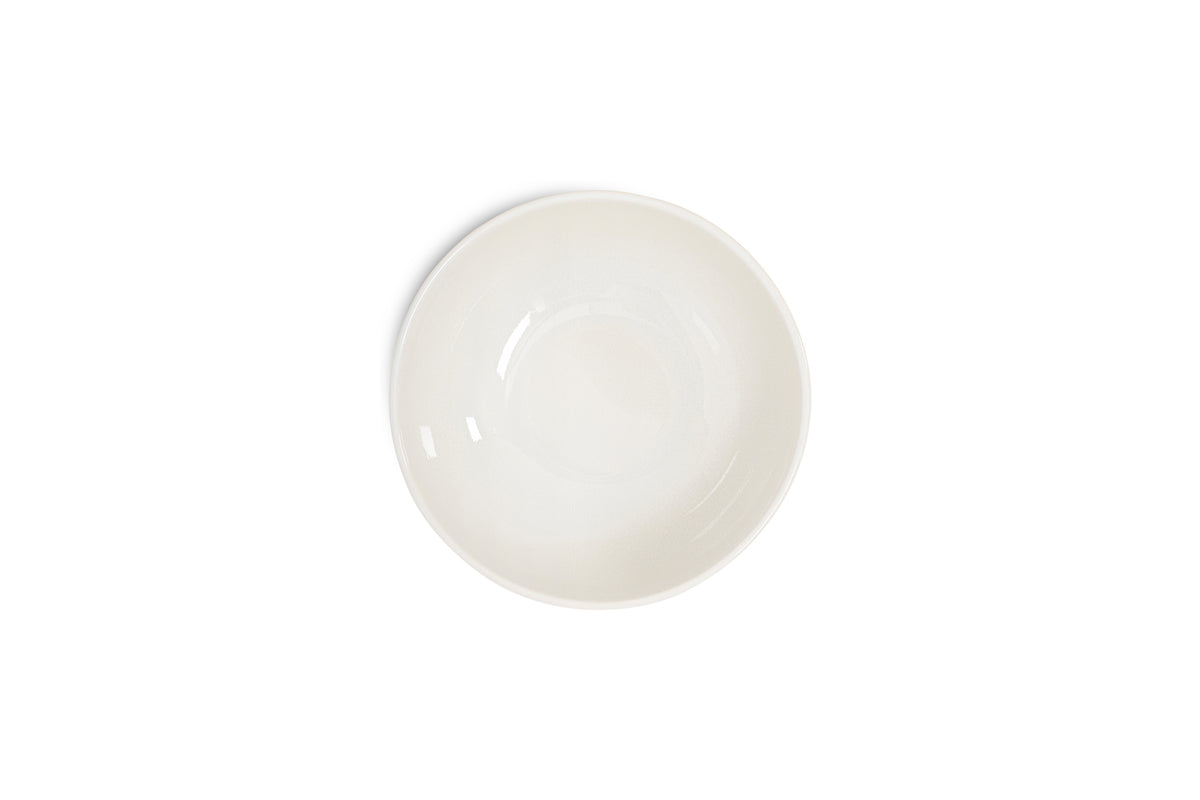 The Edo Cereal Bowl - Terracotta by nkuku is centered on a white background. Its smooth, round ceramic surface and earthy hue highlight minimalist style, with no visible patterns or decorations for a clean, modern look.