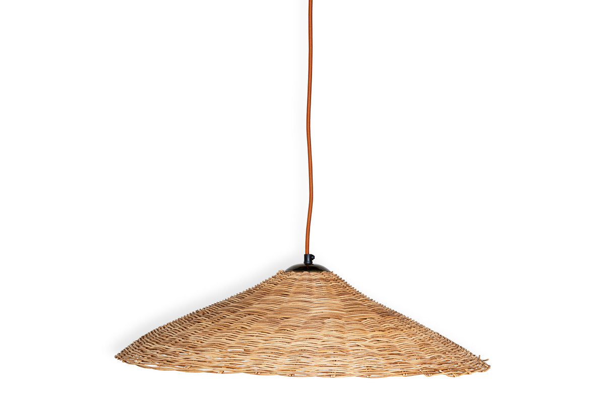The Sangu Rattan Pendant by nkuku features a natural, conical wicker shade with an open weave and textured finish, suspended from a slim orange cord against a white backdrop.