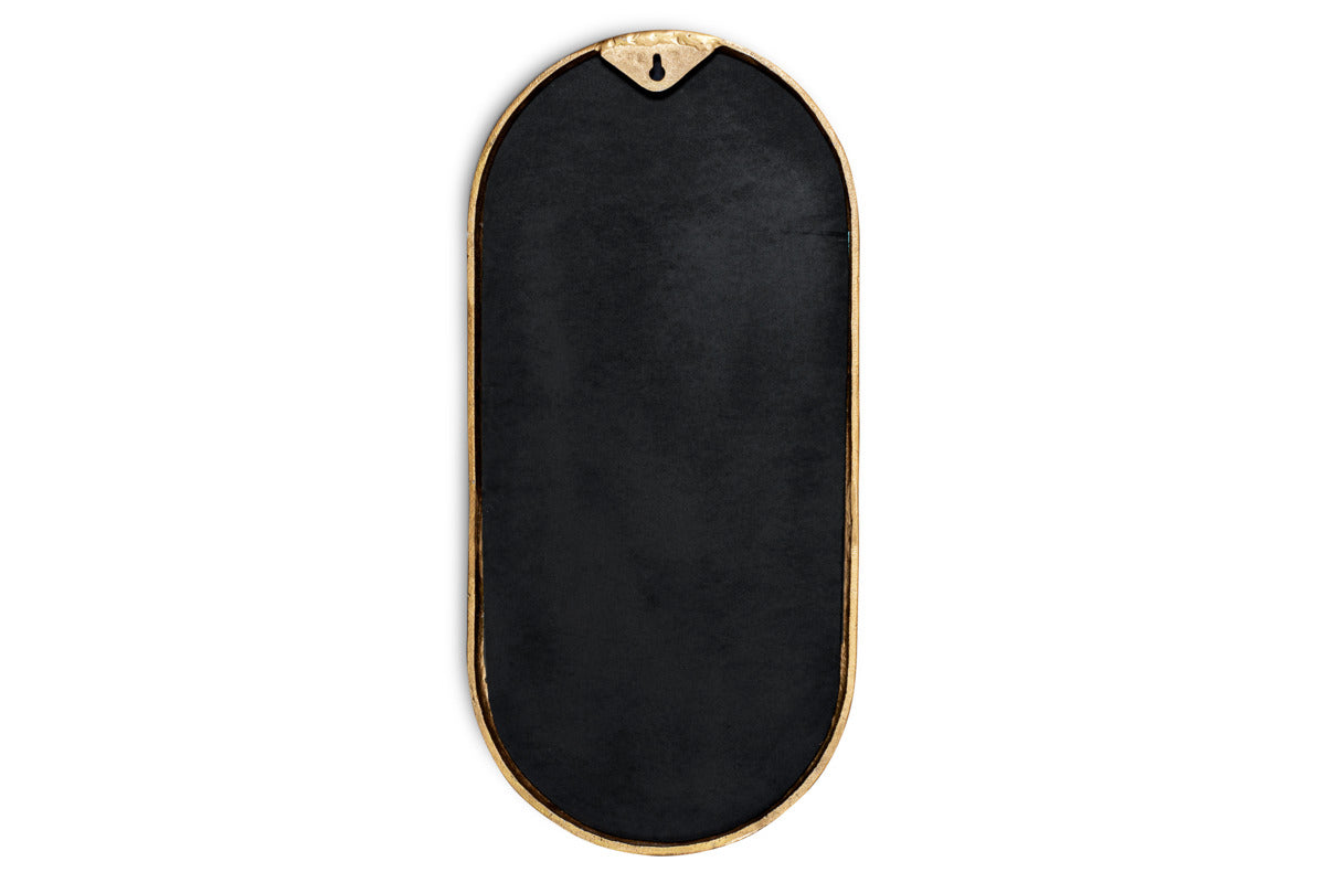 The nkuku Mbwa Oval Mirror in Antique Brass has a decorative gold frame and an elongated black oval center. It features a top triangular notch with hanging hole, and is shown against a white background.