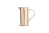 The Patthar Jug - Cream & Clay - Small by nkuku features hand-painted beige stripes and dotted lines on white ceramic, a curved handle, and a narrow spout—an eye-catching addition to your tableware collection. Displayed on a plain white background.