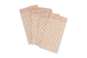 The nkuku Peplu Block Print Napkin - Terracotta, set of 4, features a charming red floral pattern with red and beige striped borders—perfect rustic table accessories or Indian-inspired napkins, elegantly displayed on a white background.
