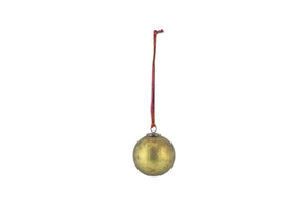 The Oko Giant Bauble - Matt Green by nkuku hangs from a red and white string against a plain white background, adding classic festive charm to your Christmas decor with its slightly worn, matt green finish.