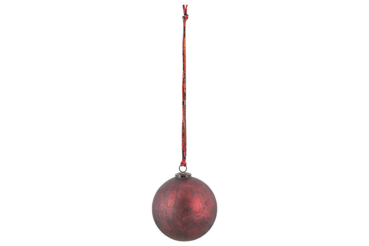 The nkuku Oko Giant Bauble - Matt Bordeaux features a single, round, dark red ornament with a textured matte finish hanging from a patterned red string, ideal for adding festive style to your Christmas decorations.
