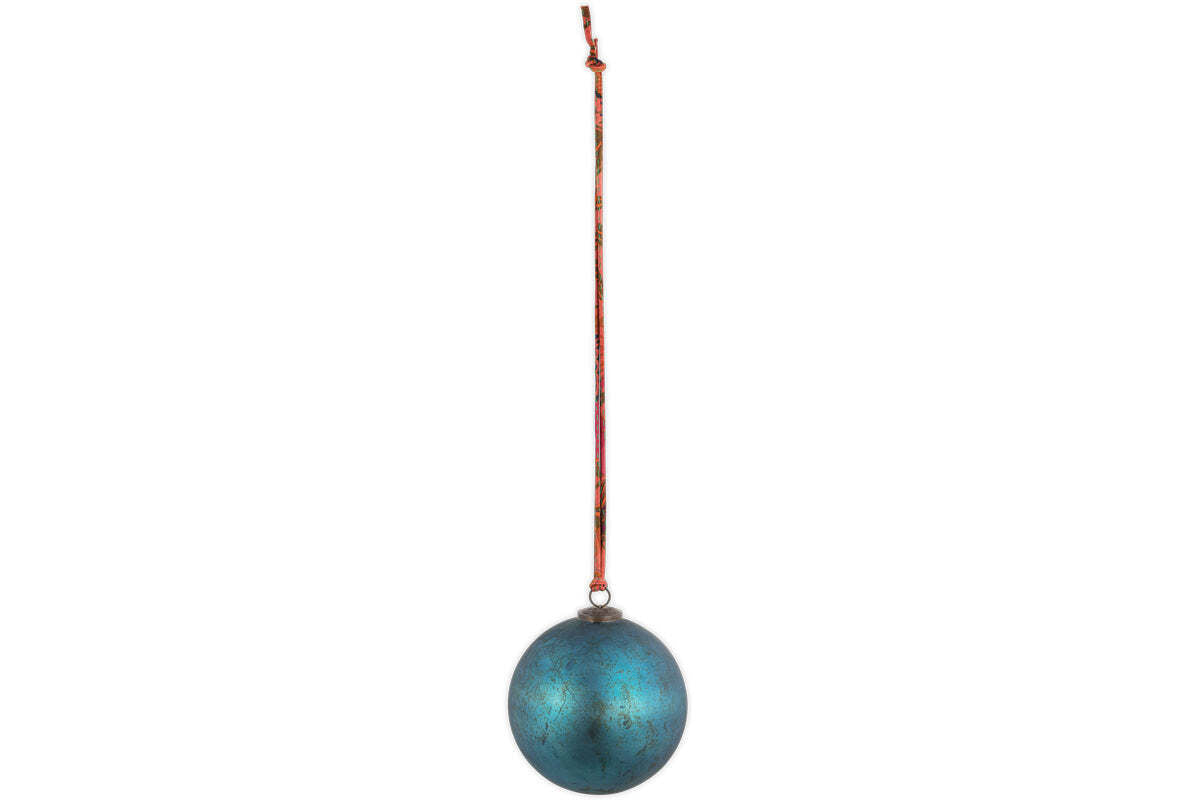 The nkuku Oko Giant Bauble - Matt Teal features a weathered blue-green finish and hangs from a thin red string against a white backdrop, offering a simple, centered look that’s ideal for festive displays or unique Christmas decorations.