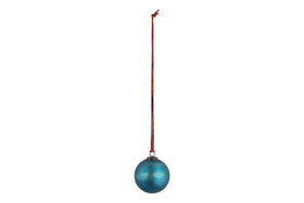 The nkuku Oko Giant Bauble in matt teal, shaped like an egg with a metallic finish, hangs from a long red ribbon against a white background—a simple yet elegant addition to any festive Christmas display.
