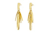 The Omuti Earrings - Gold by nkuku feature multiple elongated, textured, overlapping leaf-shaped charms on a gold post—a striking contemporary accessory finished in a party-ready gold tone.