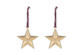 The nkuku Roshani Star Baubles - Antique Brass (Set of 2) feature five-pointed gold stars with a textured finish, hanging from burgundy ribbons and perfect for festive decor.