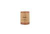 A Rustic Soy Blend Mini Pillar Candle in rust by nkuku with a textured finish and label, shown against a plain white background.