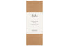A rectangular box with a brown base and a white label featuring the nkuku brand. The label reads Cedarwood & Fig Reed Diffuser, describing the inviting cedarwood fragrance inside.