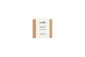 A Cardamom & Amber 1 Wick Scented Candle by nkuku in minimalist brown packaging, featuring sandalwood notes. The natural blend and handcrafted design evoke warmth and comfort.