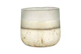 A translucent, frosted glass cup with a rounded shape and a gradient from clear to white with gold-speckled accents holds the nkuku Cardamom & Amber 3 Wick Scented Candle.