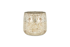 The nkuku Mandarin & Clove 1 Wick Scented Candle features a small, rounded metallic pot with a distressed silver and gold finish, filling your space with festive spiced mandarin fragrance. Shown on a plain white background.