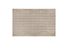 The nkuku Shanti Wool & Cotton Rug - Natural is a beige rectangular area rug with a textured surface and horizontal and zigzag line patterns, shown on a white background.
