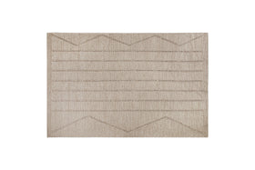 The nkuku Shanti Wool & Cotton Rug - Natural is a beige rectangular area rug with a textured surface and horizontal and zigzag line patterns, shown on a white background.