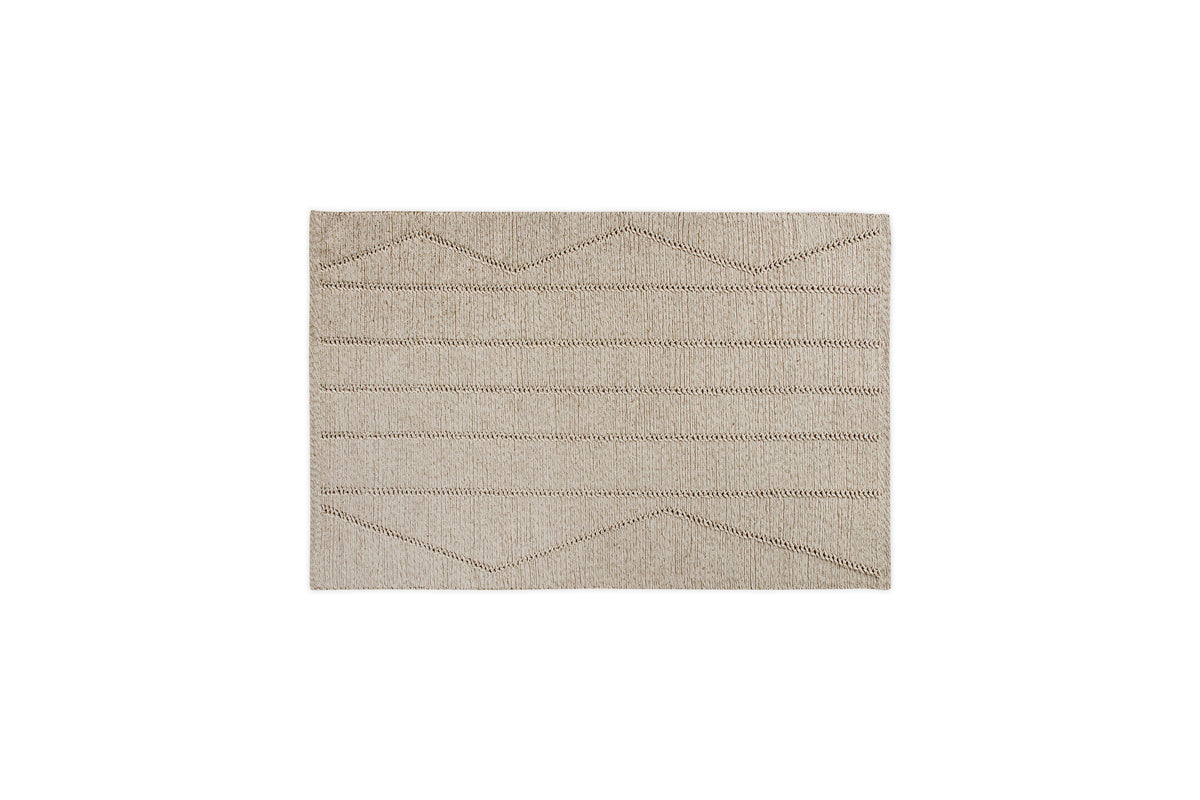 The Shanti Wool & Cotton Rug - Natural by nkuku is a square beige rug with subtle thin zigzag and horizontal brown patterns, set against a white background.
