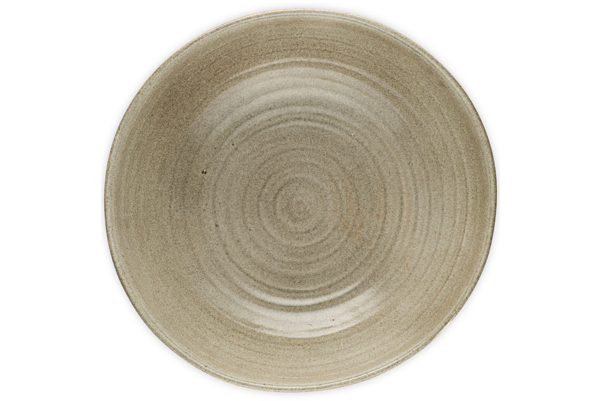 The nkuku Valinha Earthenware Footed Bowl in grey features a subtle ribbed texture and circular patterns, ideal for rustic tablescapes, shown from above on a white background.