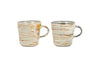 The nkuku Vizo Mugs - Grey (Set of 2) feature distinctive earthy marbled patterns with a unique glaze in beige, brown, and gray, each coffee mug including a comfortable handle. Displayed side by side against a white background.